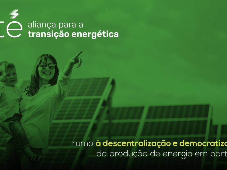 Woman holding a child, solar pannels behind them
